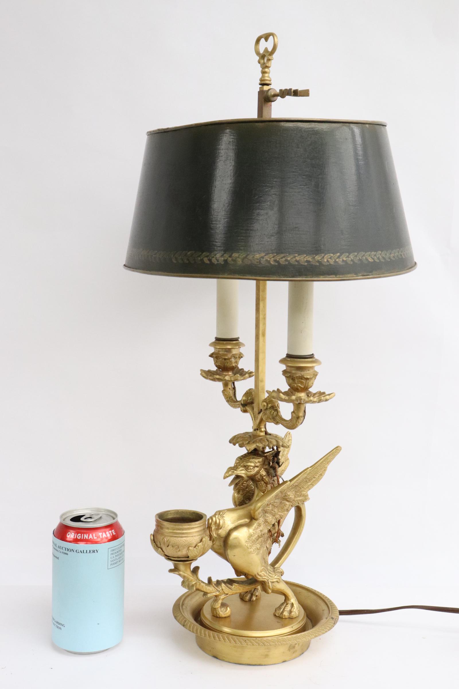 A gilt bronze wall light in flying dragon motif (1 of 9)