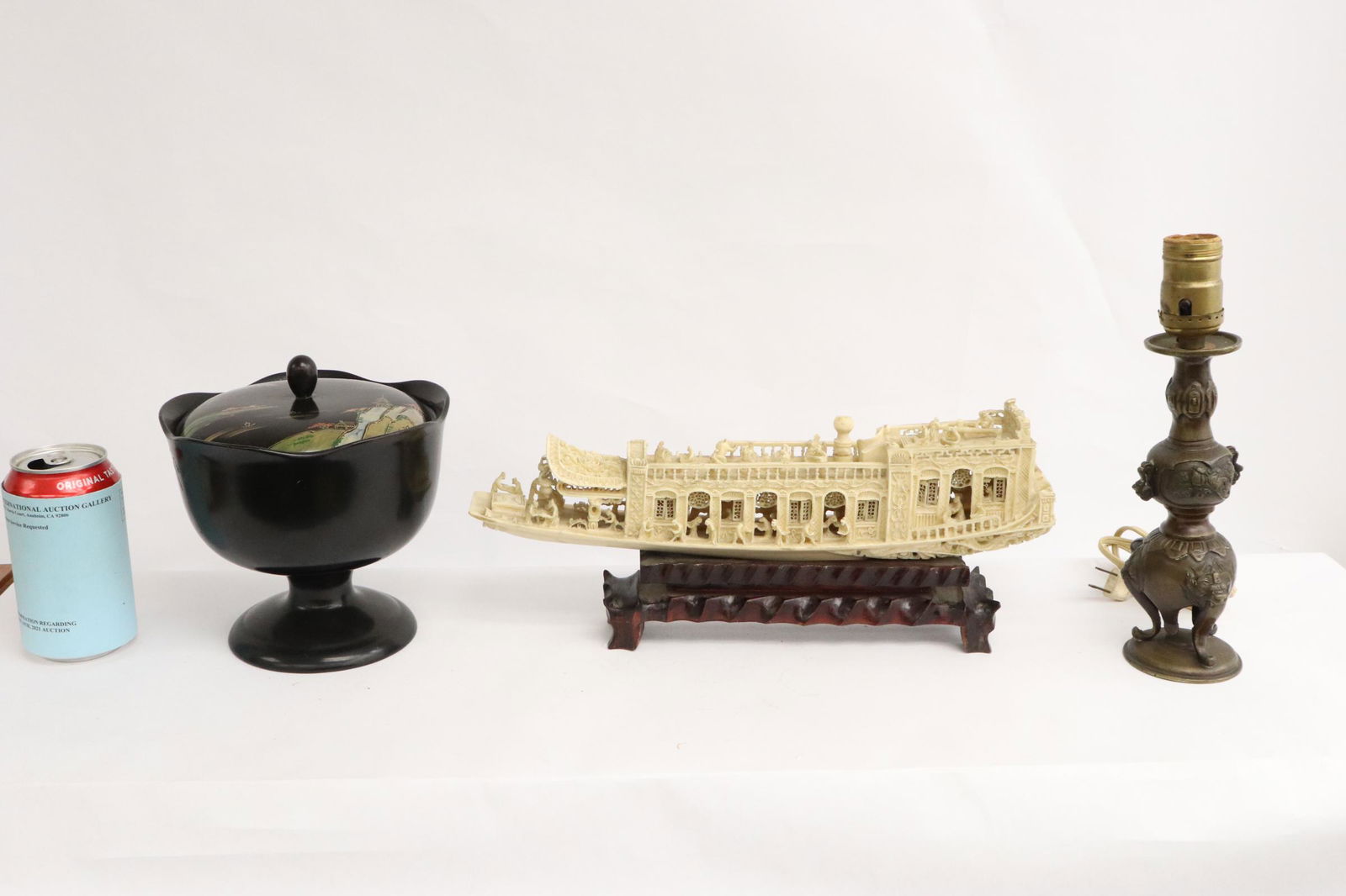 3 items: Japanese antique bronze based lamp (10.15"H), a lacquer covered bowl (7.25"Hx6.8"dia) and a Chinese resin casted boat (13.75"L) on stand