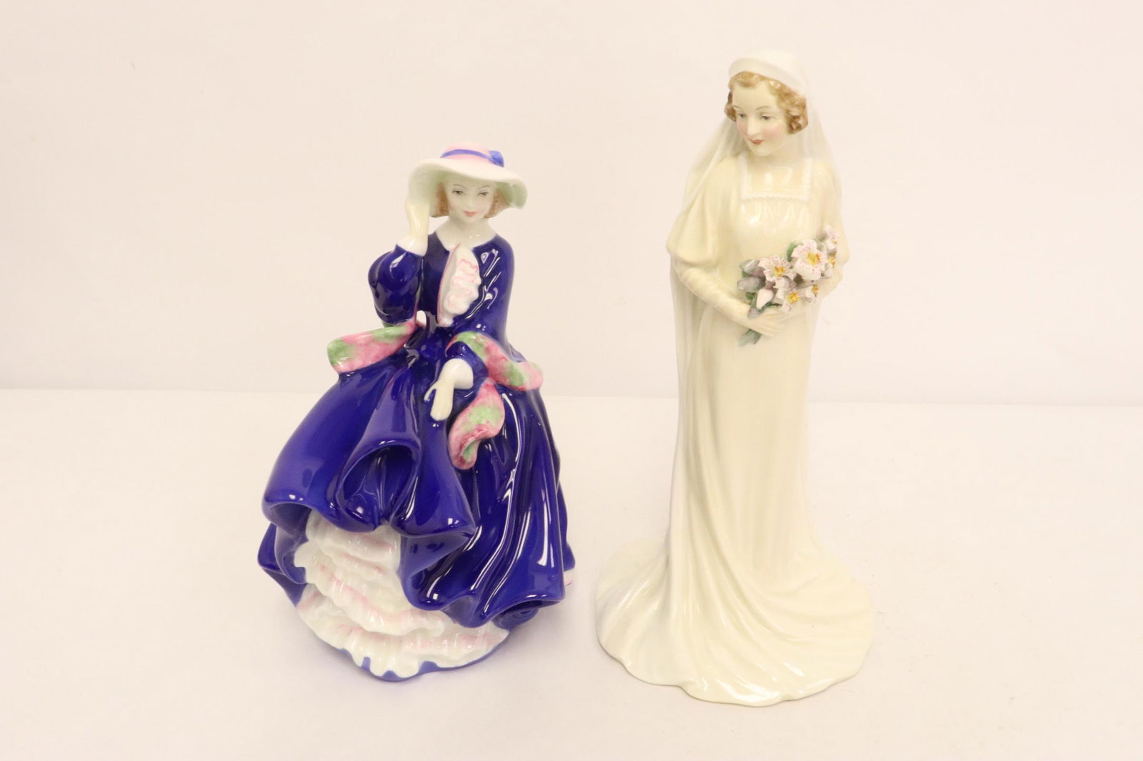 2 Royal Doulton figures (1 of 11)