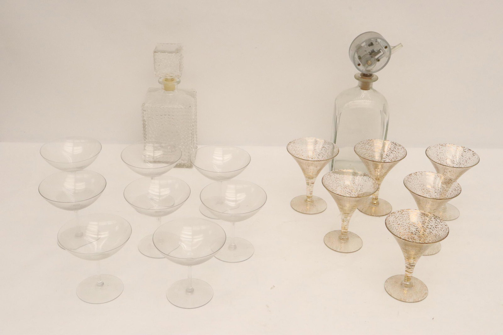 14 martini glasses and 2 decanters: 14 martini glasses and 2 decanters; including one music decanter