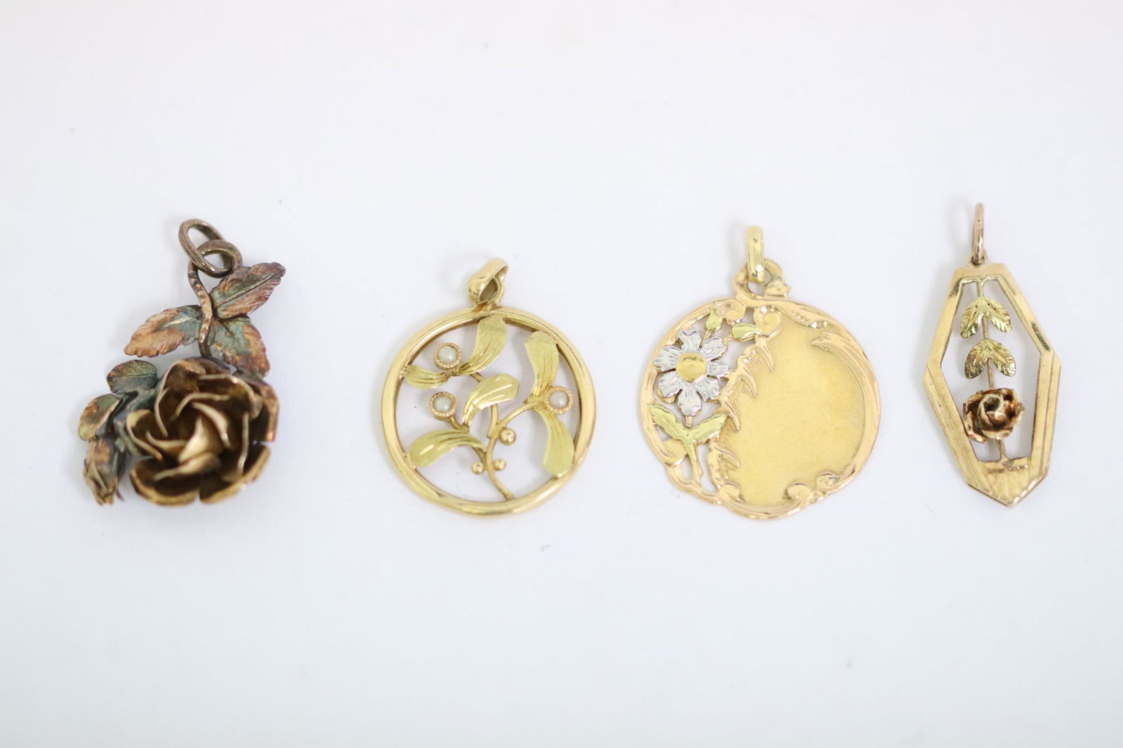 Four 14K Y/G charms/ pendants (1 of 9)