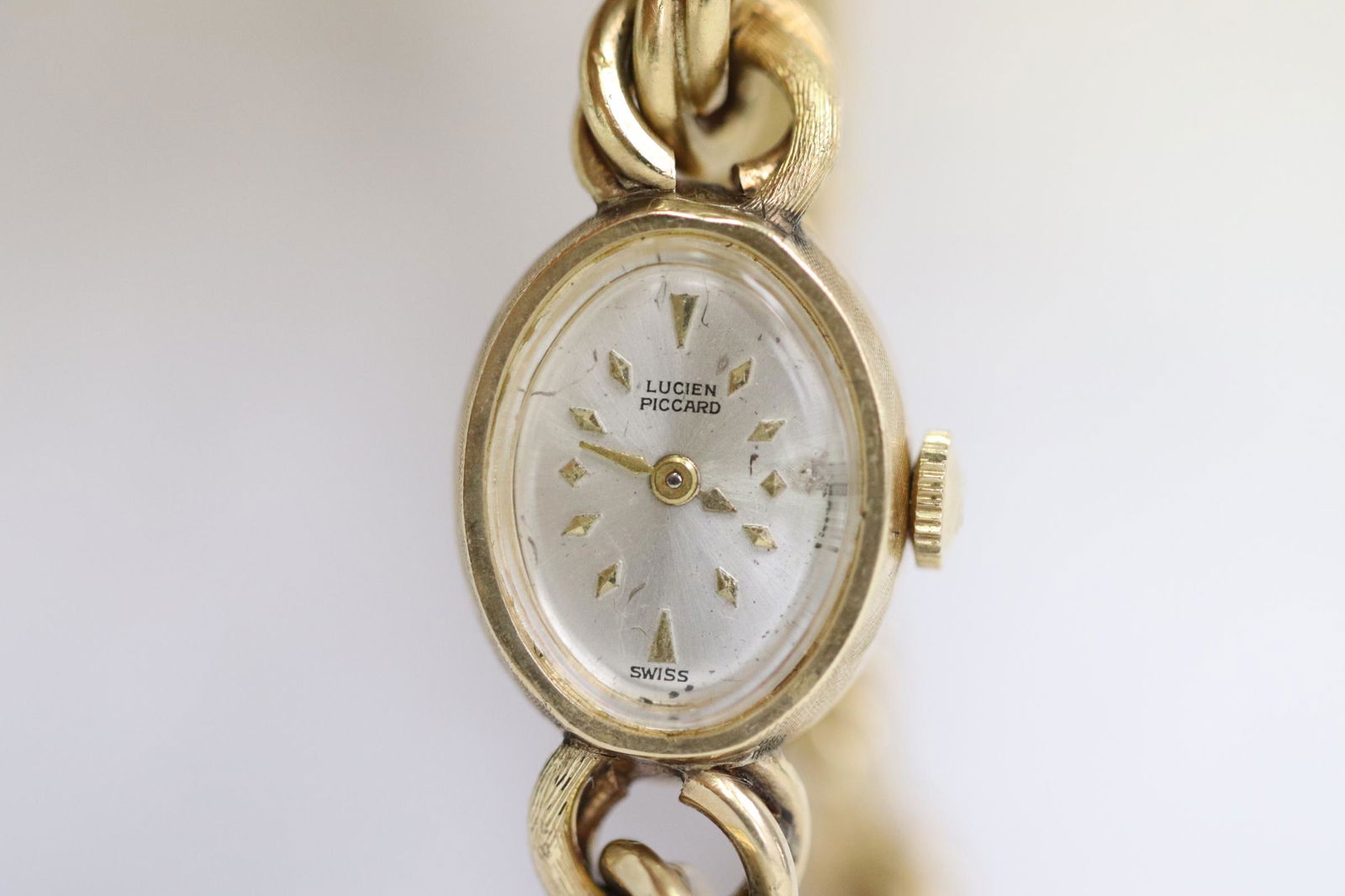 Lady's heavy Lucien Piccard watch w/ 14K chain (1 of 11)