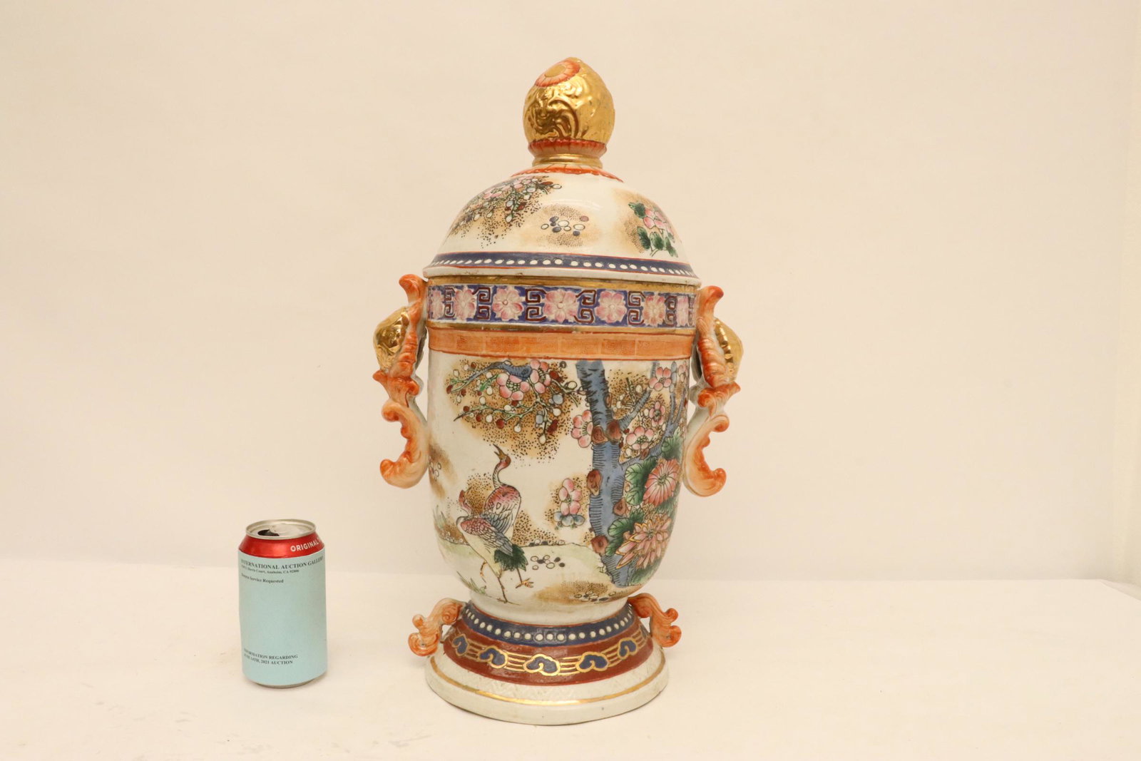 A large hand painted porcelain covered jar (1 of 10)