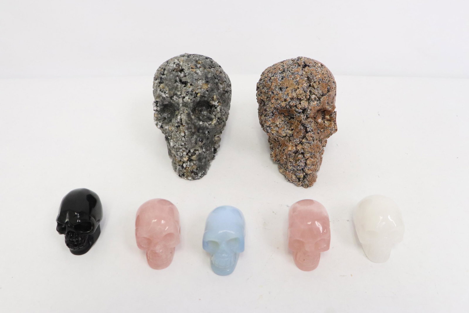 5 stone carved skulls and 2 cement skulls (1 of 13)