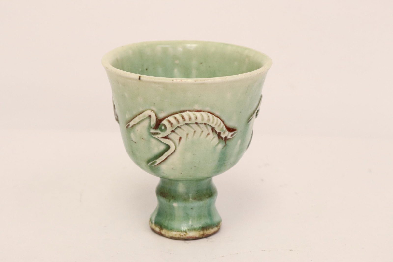 A green glazed wine cup: A green glazed wine cup, 4.15"Hx3.8"dia