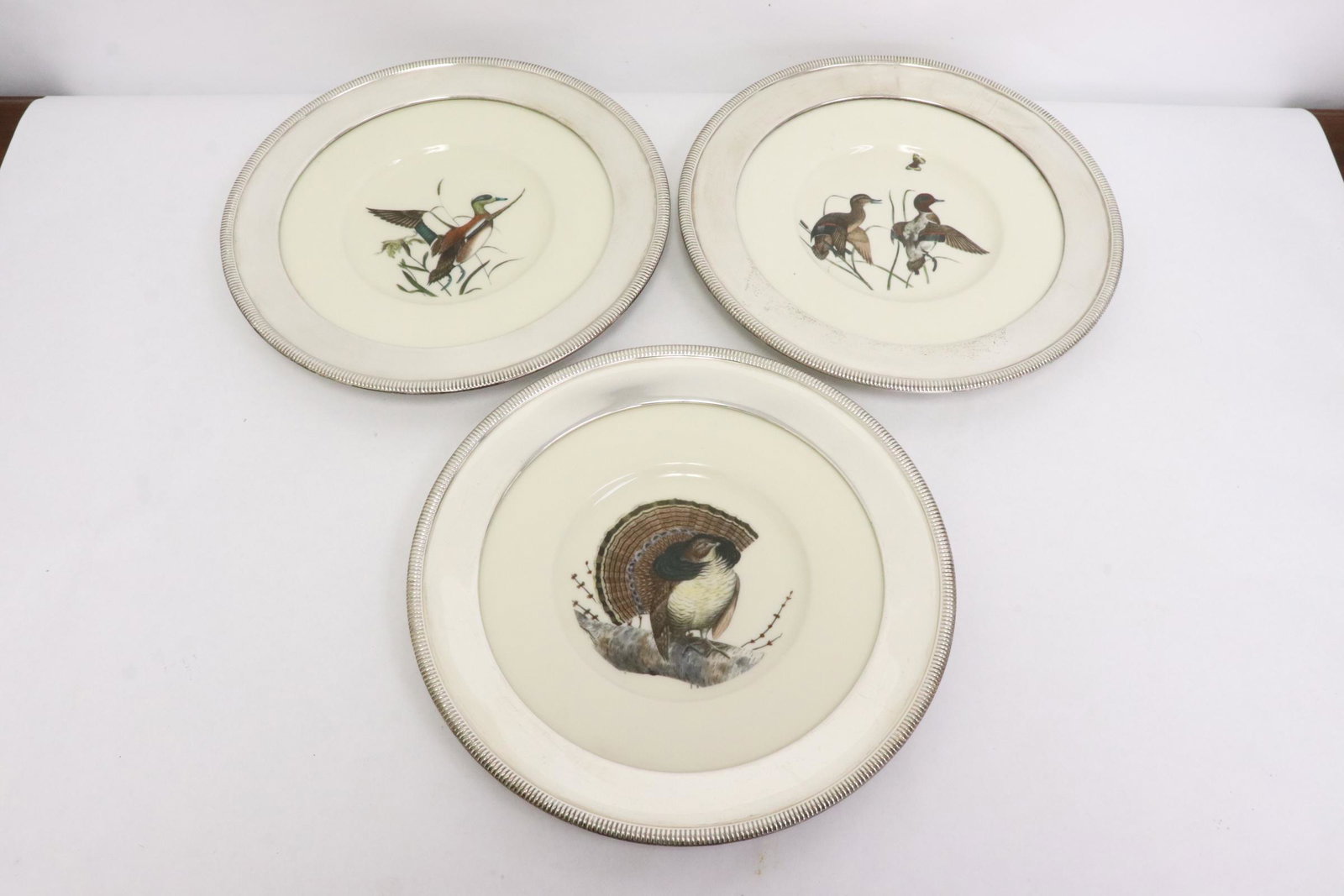 3 Lenox sterling rim porcelain plate: 3 Lenox sterling rim porcelain plate, 1"Hx11.25"dia each