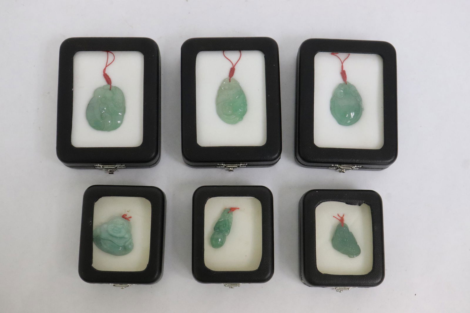 6 boxes of jadeite carved ornaments (1 of 7)