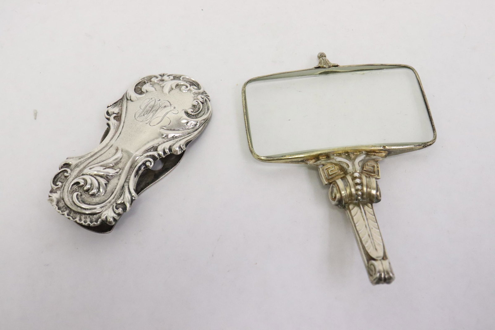 Sterling paper clip & sterling handled magnifier: Sterling paper clip (3.35"L) and sterling handled magnifier (4.5"L)