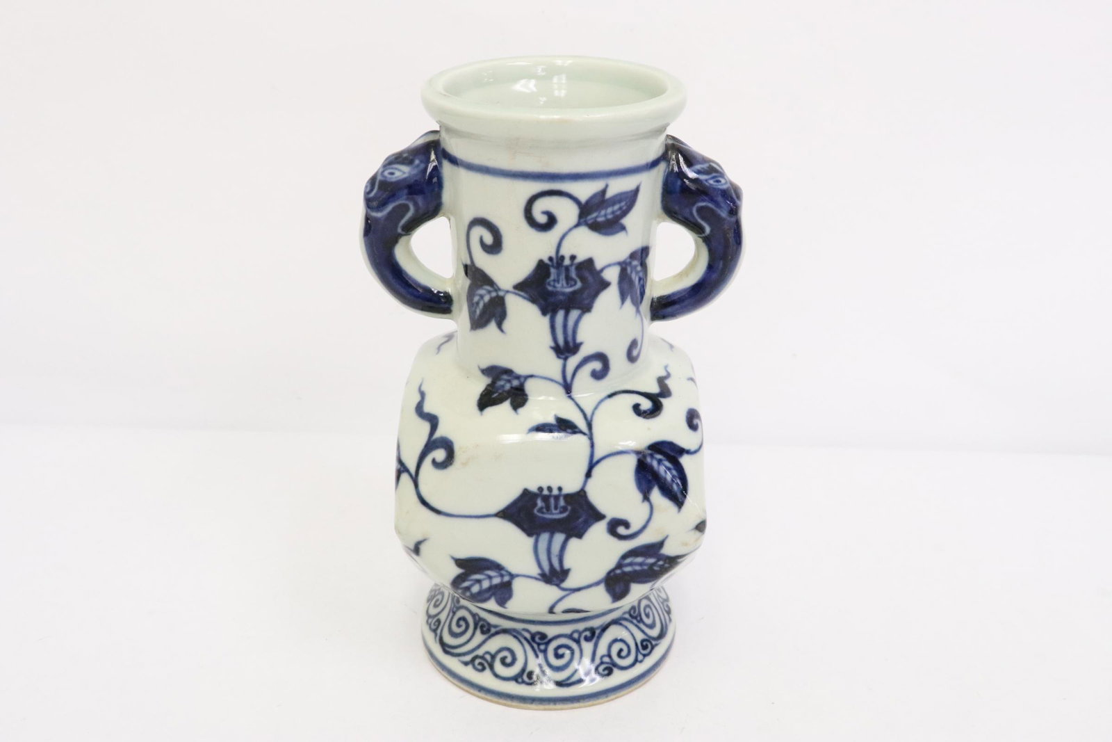 A blue and white porcelain square vase: A blue and white porcelain square vase, 7.35"Hx3.6"x3.6"
