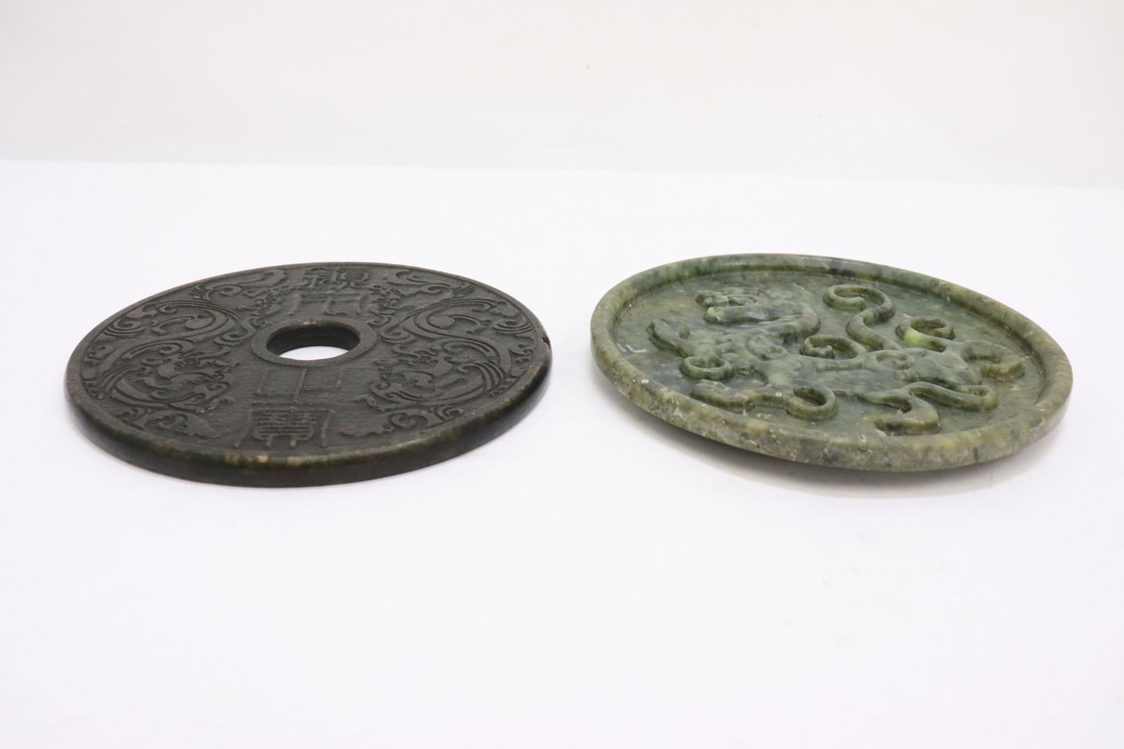 2 Chinese jade like stone carved round plaques (1 of 9)