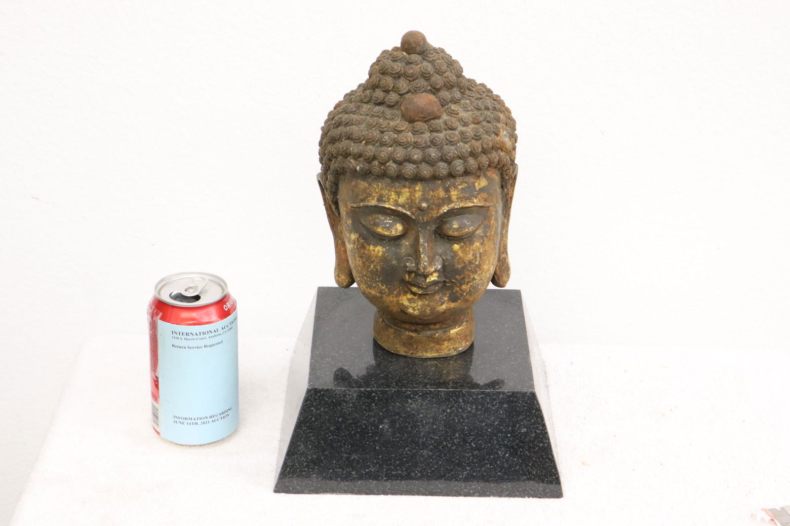 Cast iron Buddha head on stand (1 of 12)