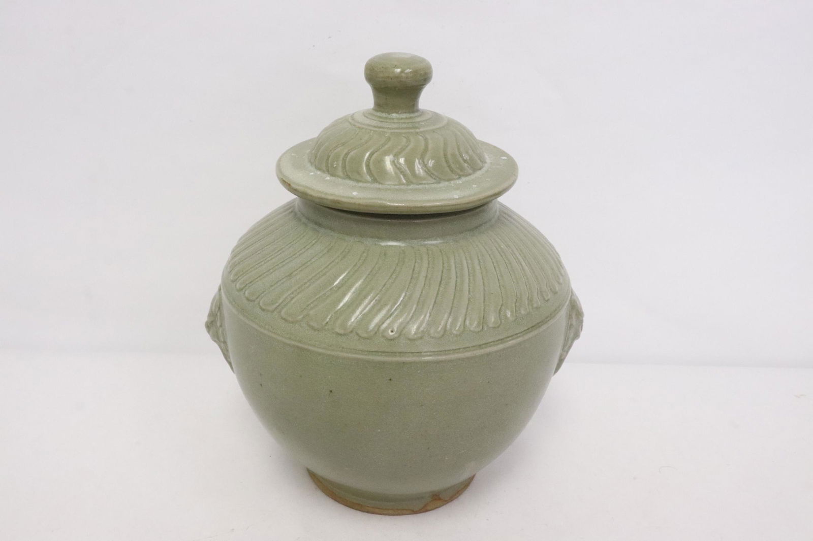 A vintage Song style celadon covered jar (1 of 9)