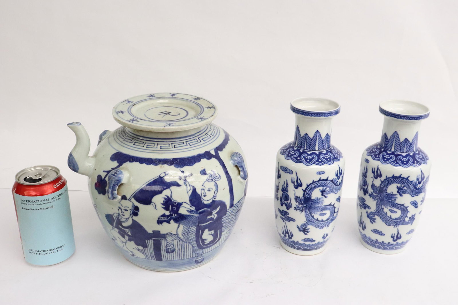 3 blue and white porcelain pieces: 3 pieces; 2 Chinese vintage blue and white porcelain vases (drilled, 8.15"Hx3.45"dia each), and an antique Chinese blue and white porcelain wine server (top edge chip, 7.85"Hx9"x8")