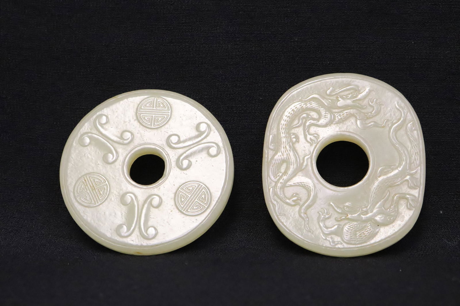 2 Chinese light celadon jade carved disc (1 of 9)
