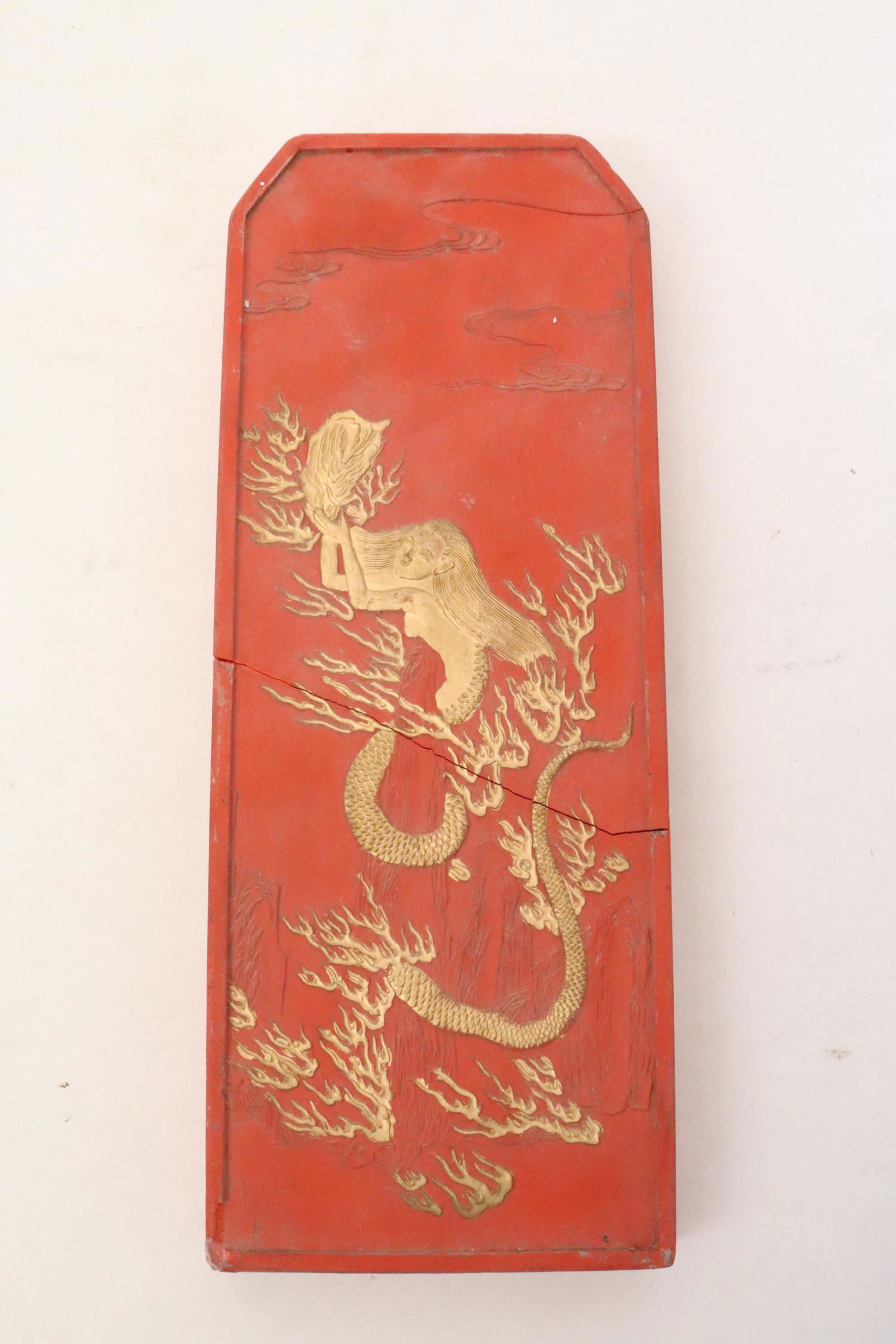 A large red ink stick, damage (1 of 10)