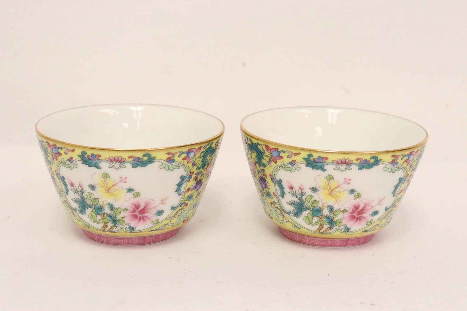 Pair Chinese famille rose porcelain tea cups: Pair Chinese famille rose porcelain tea cups, 2"x3.3"dia