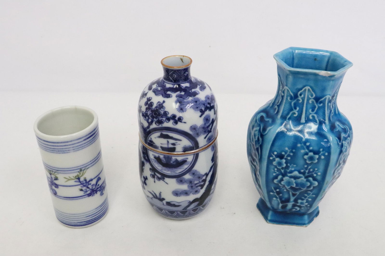 3 pieces: 3 pieces; blue and white toothpick holder, blue and white vase, and a blue glazed export vase (top edge chip), 3.7"x1.8"dia - 5.7"x3.3"x2.7"