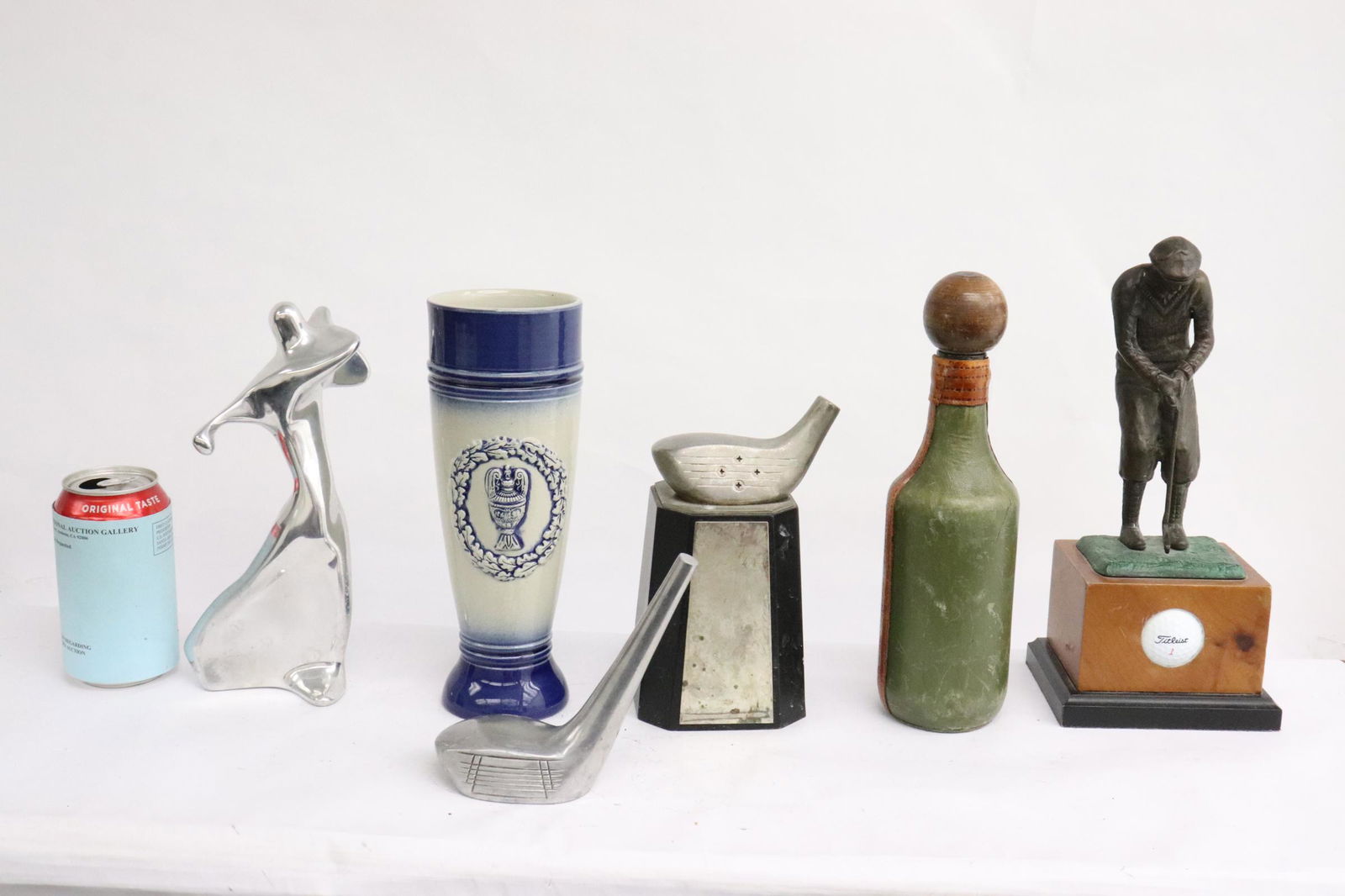 6 piece golf memorabilia and trophies: 6 piece golf memorabilia and trophies; including a bronze sculpture(7.75"H) of golfer