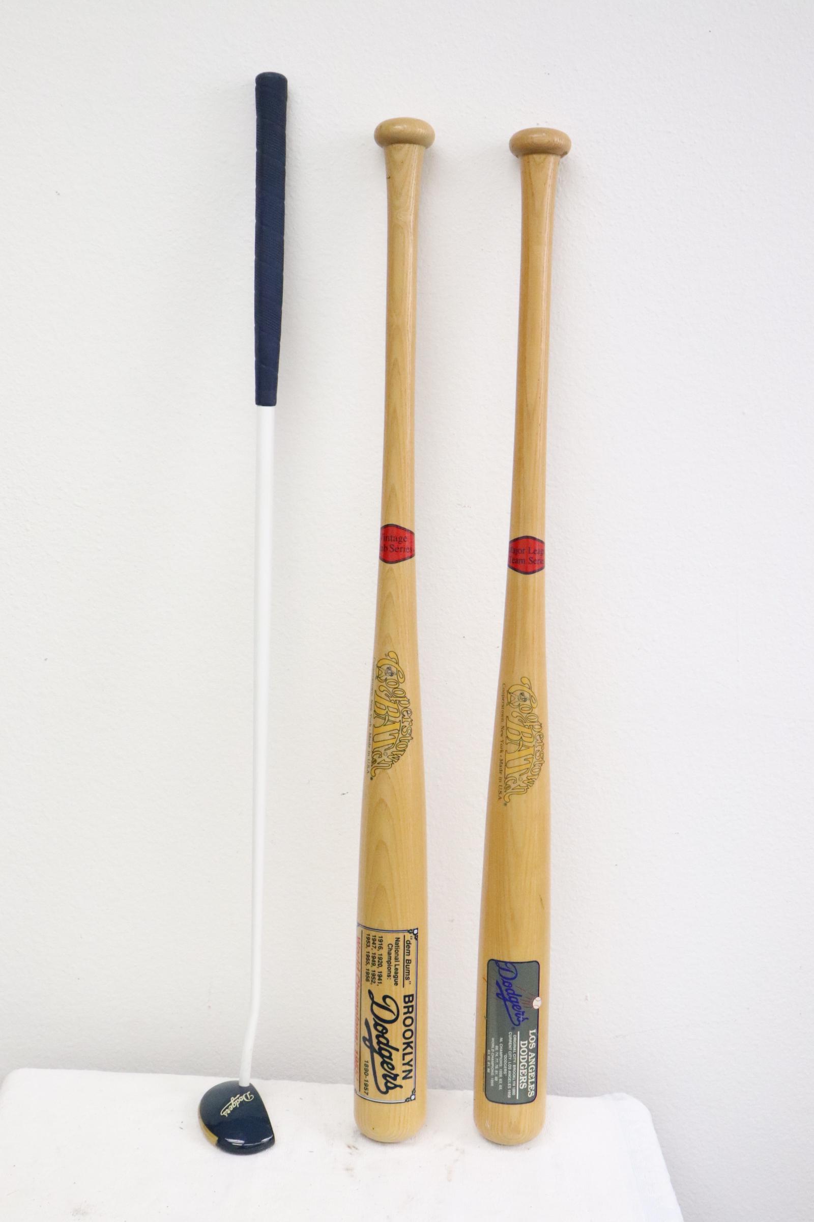 2 hall of fame baseball bat and a Dodger golf putter: 2 hall of fame baseball bat (34") and a Dodger golf putter (35")
