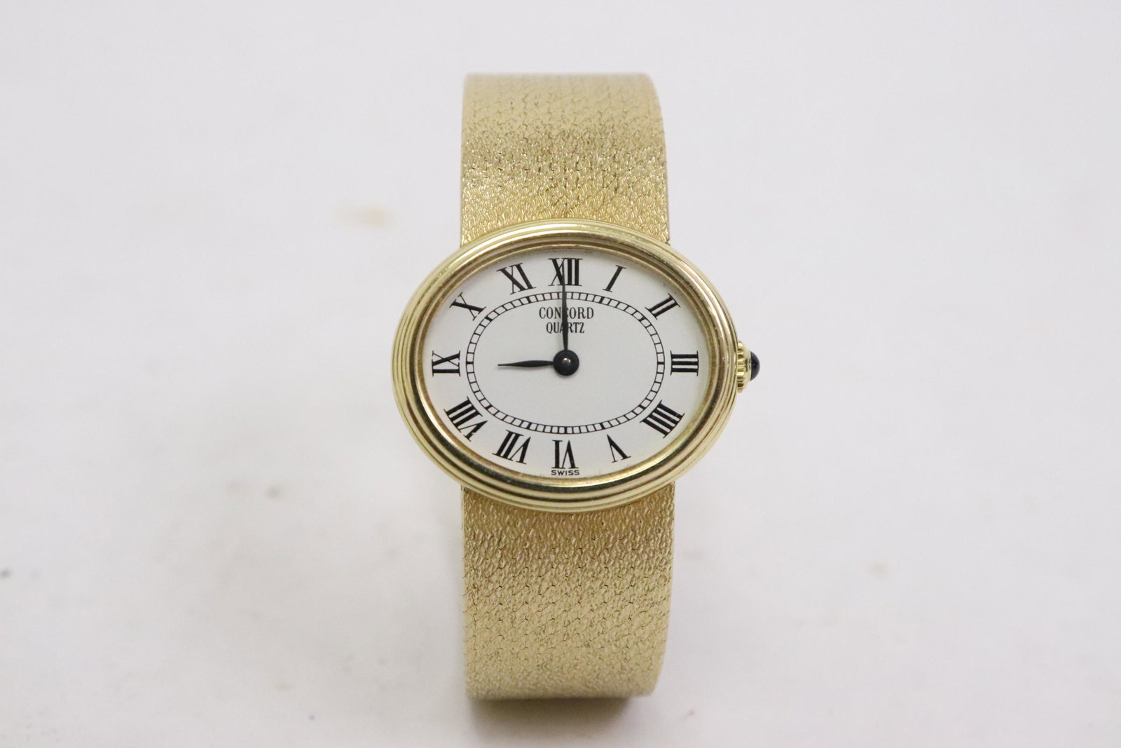 14K Concord wrist watch w/ 14K Y/G band: A beautiful 14K Concord wrist watch, attached to a 14K Y/G band, wt. 42gm