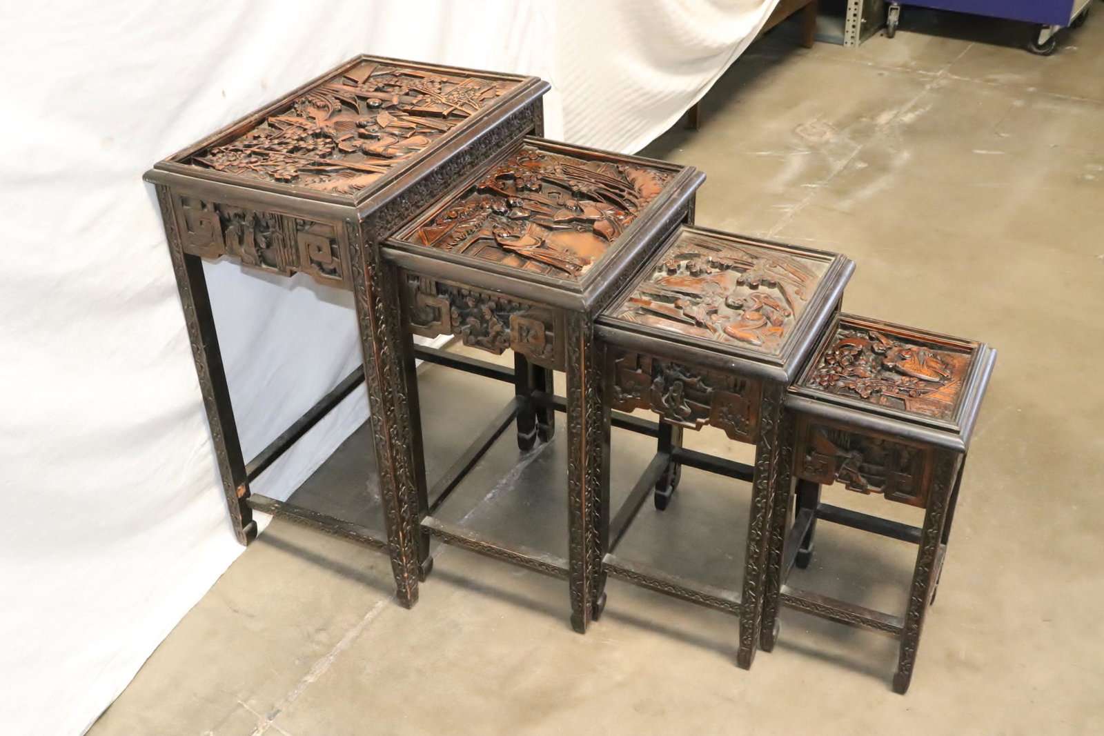 Set of 4 Chinese antique carved stacked tables: Set of 4 Chinese antique carved stacked tables, 18.5"x9.9"x9.6" - 27.3"x20.6"x14.4"