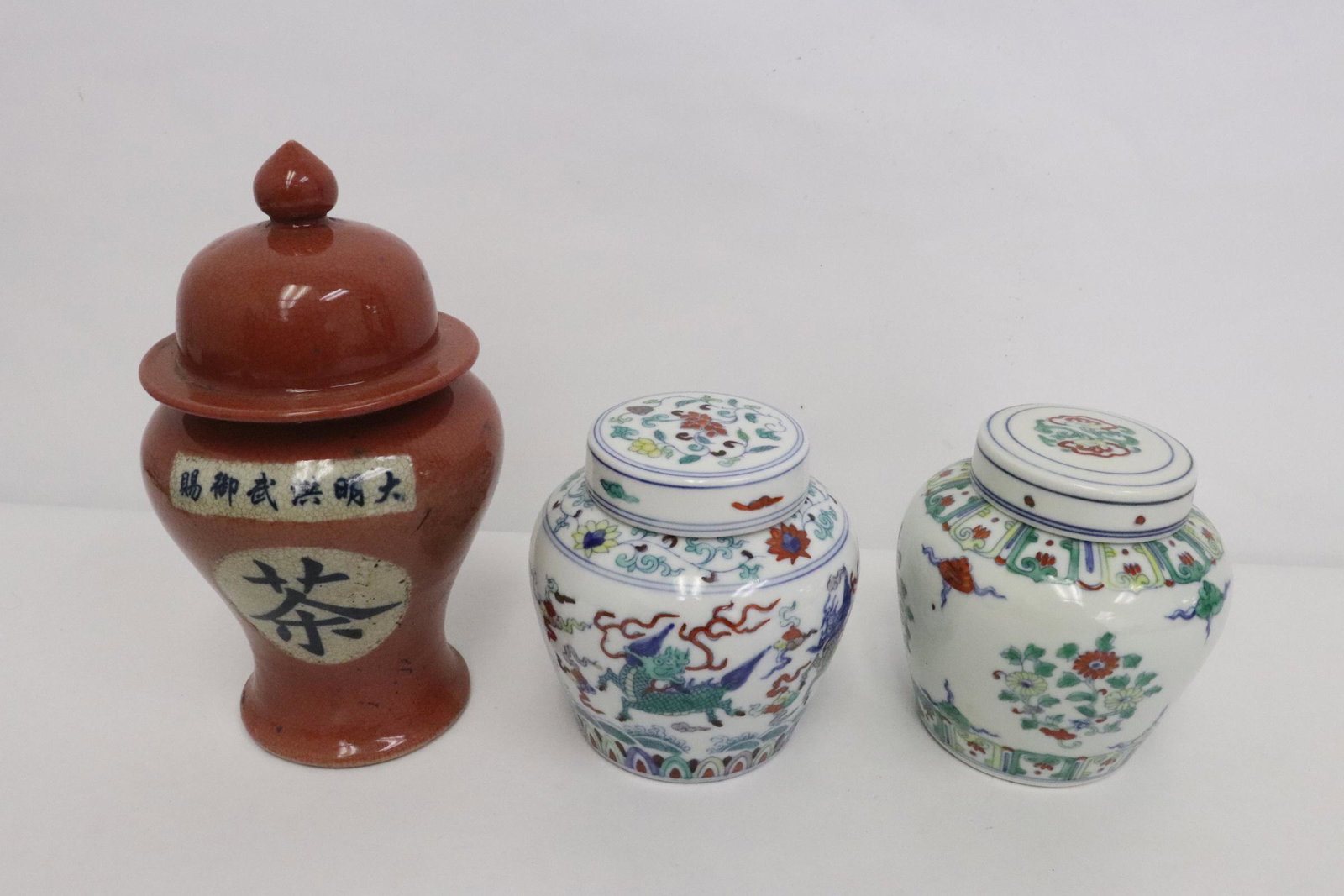 4 porcelain covered jars (1 of 10)