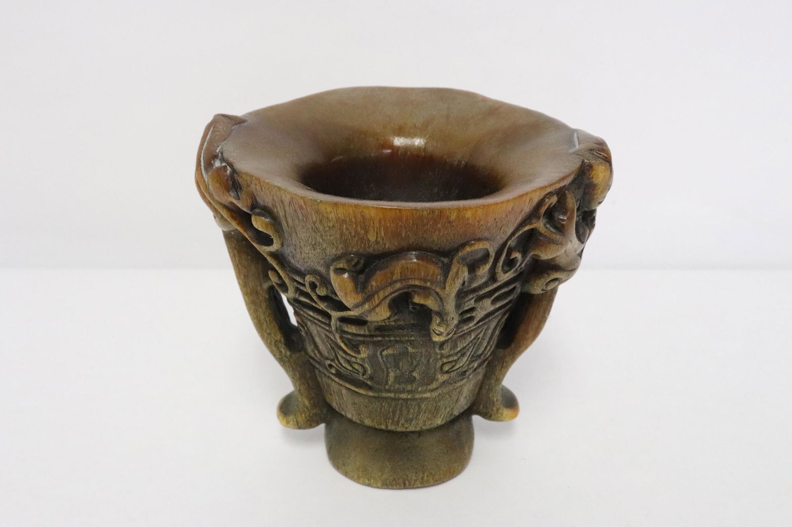 Simulated horn carved libation cup (1 of 10)