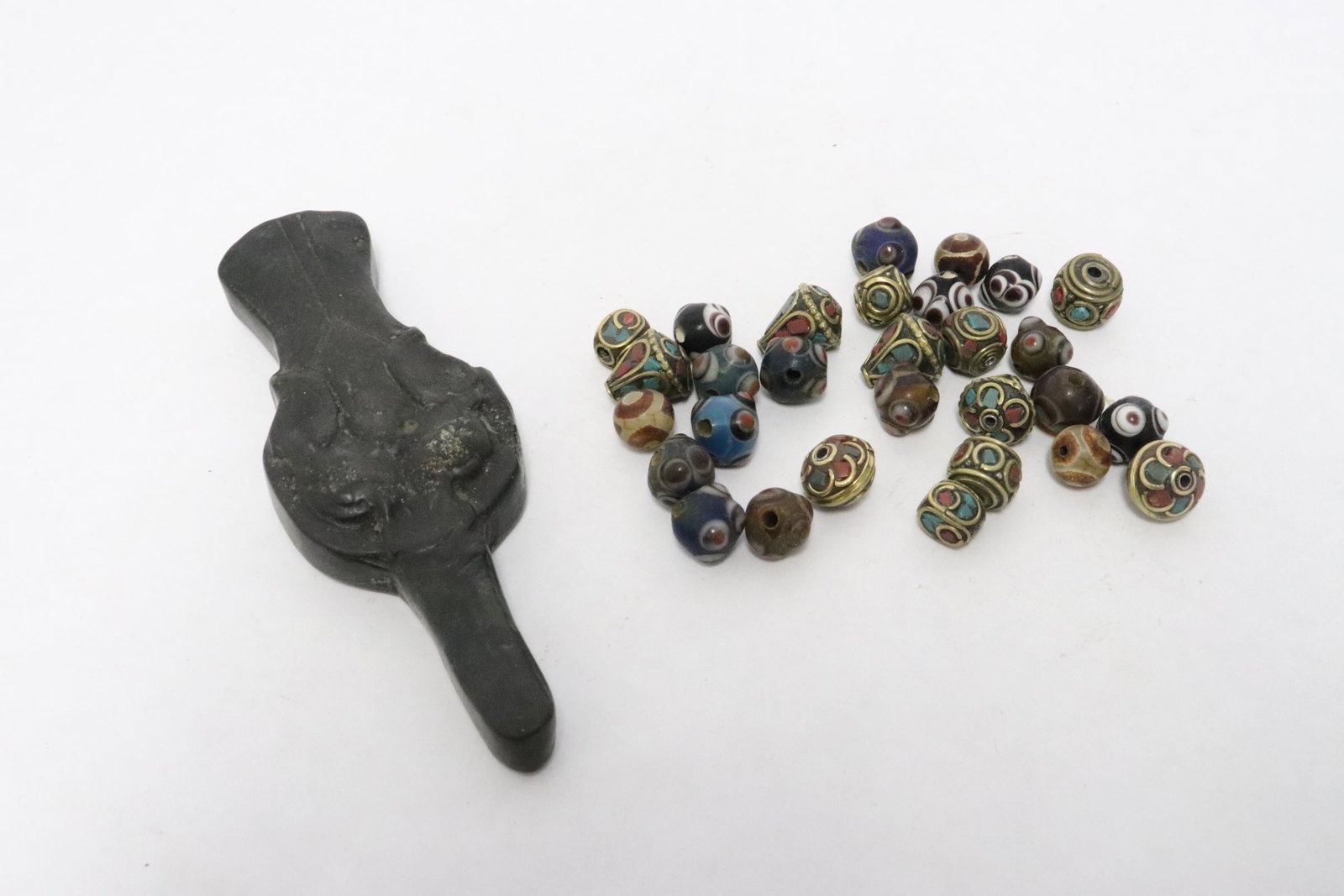 Lot of beads and a stone like ornament (1 of 9)