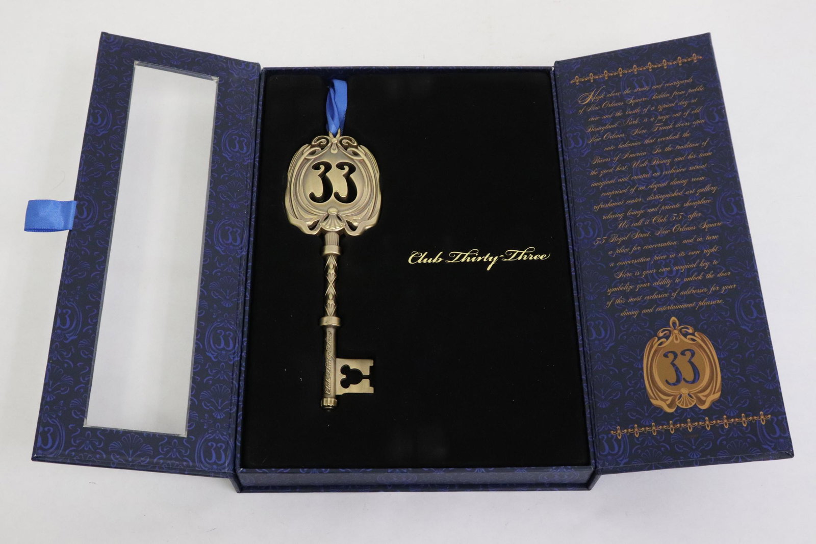 A replica key made for club 33 members: A rare replica key made exclusively for club 33 members, the key (6.7"L x2") is for the front door of club 3, at 55 Royal Street, New Orleans square, the key has never been took out the box, in brand 