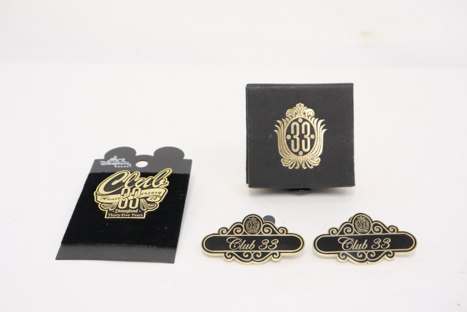 4 club 33 pins: 4 club 33 pins; 2 club 33 lapel pin, a Disney 35 year anniversary pin, and a limited edition Mickey pin, 1.5"x1.1" - 1.5"x1.4"
