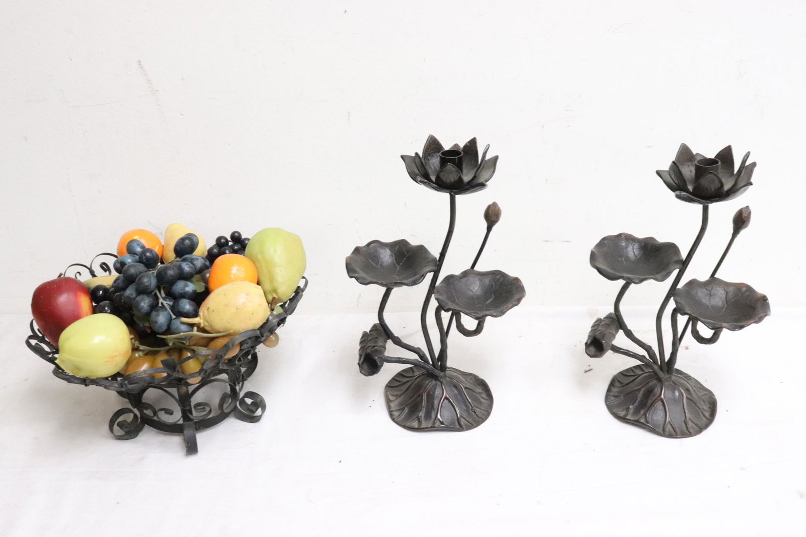 Pr cast iron candelabra, & a cast iron center bowl: Pair cast iron candelabra (13"H), and a cast iron center bowl (6"x12.5"dia) with plastic fruits