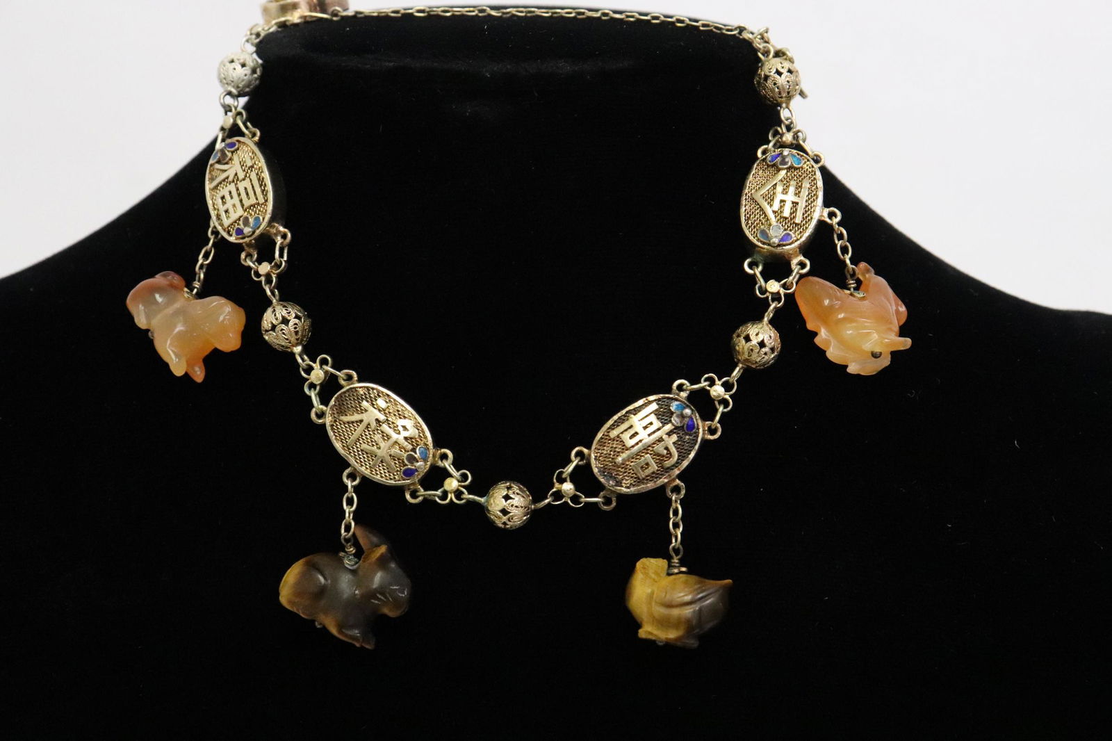 Chinese antique enamel silver charm bracelet: Beautiful Chinese antique enamel silver charm bracelet (~8.4"L) with agate and tiger eye carved charms carved in animal motif