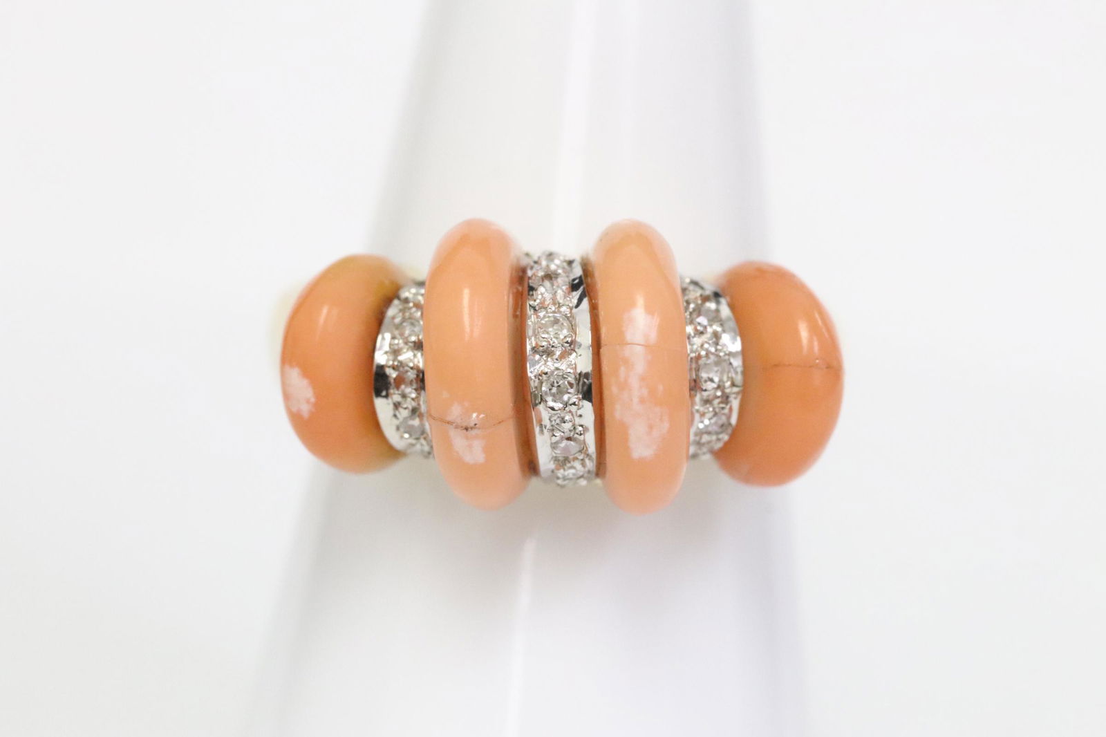 18K Y/G ring w/ diamonds and corals by J. Rossi: Art deco 18K Y/G ring set with diamonds and corals, coral has hairlines, by J. Rossi, wt. 6.9gm, size 6.5, NO INTERNATIONAL SHIPPING OF CORAL