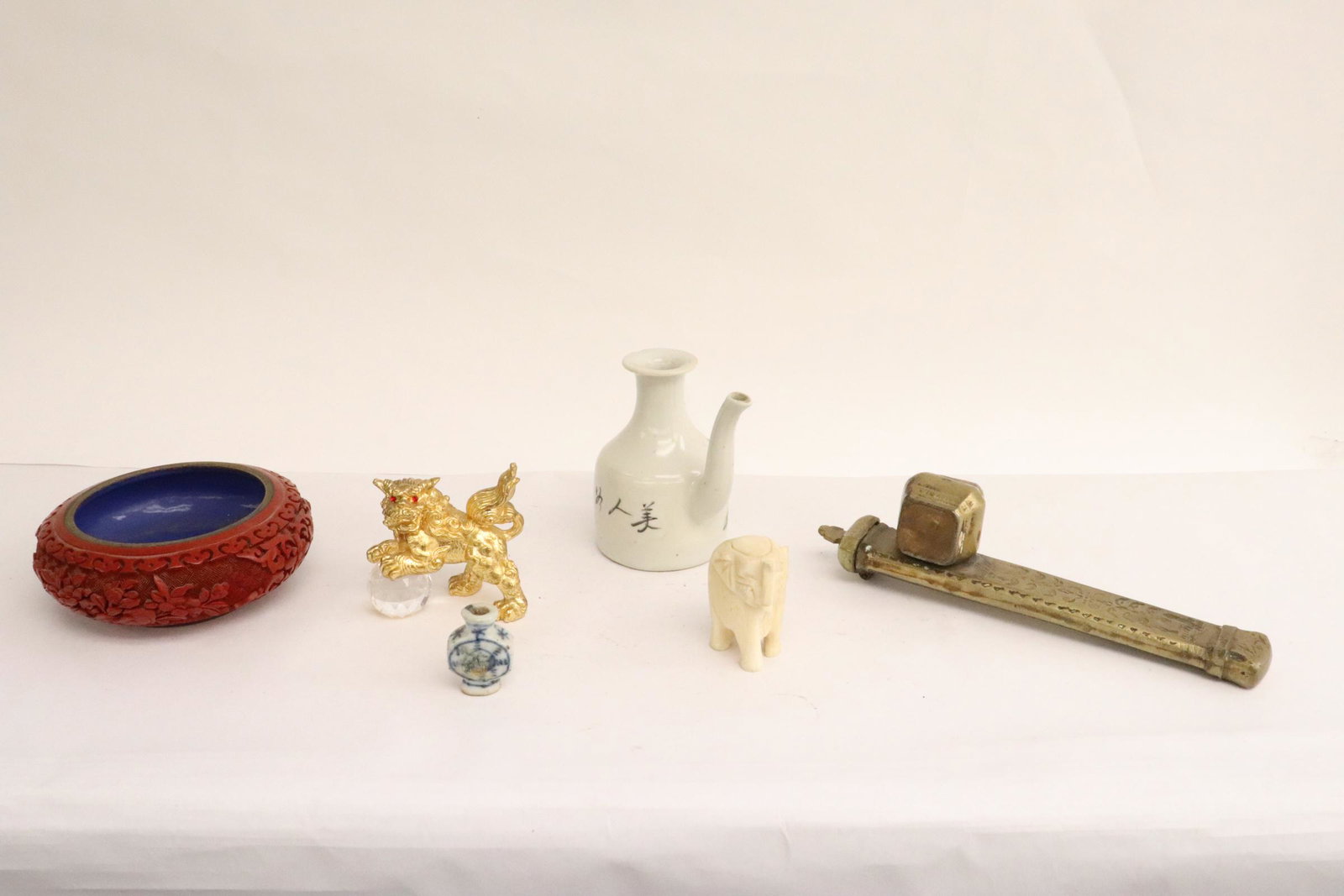 6 pieces: 6 pieces; cinnabar bowl (1.7"x5"dia), Ming blue and white small medicine bottle (1.5"x1"x0.5"), artist brush case (8.3"x2.3"x1.7"), antique famille rose teapot (minor chip) (3.8"x3.8"x2.6"), etc