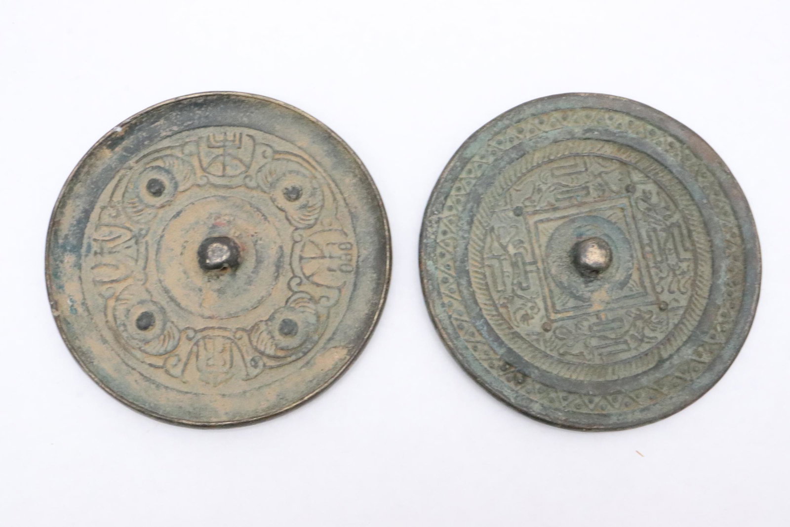 2 Chinese bronze mirrors: 2 Chinese bronze mirrors, 0.3"x3.75"dia, 0.25"x3.75"dia