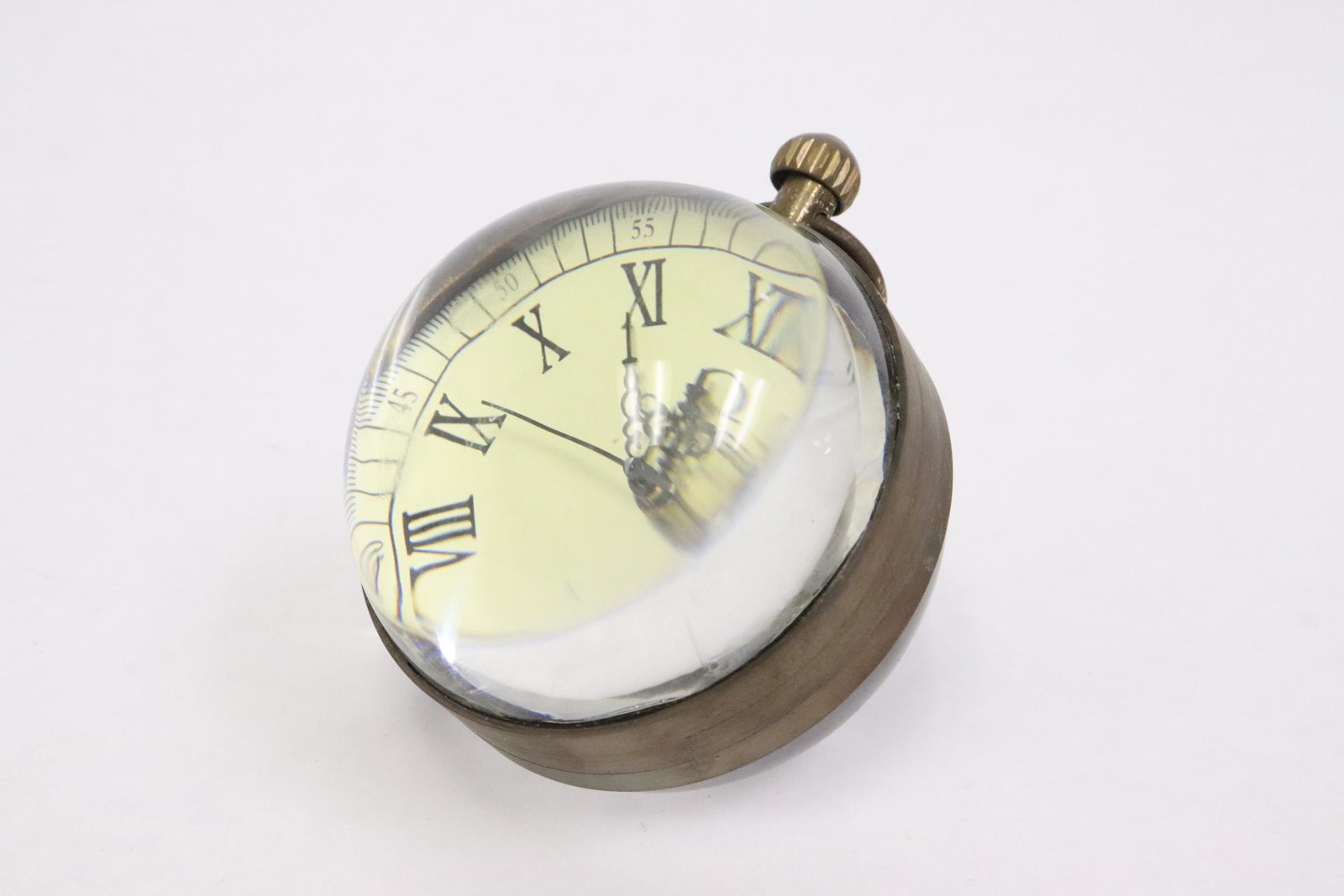 A reproduction clock: A reproduction clock, 2.15"x2.2"dia