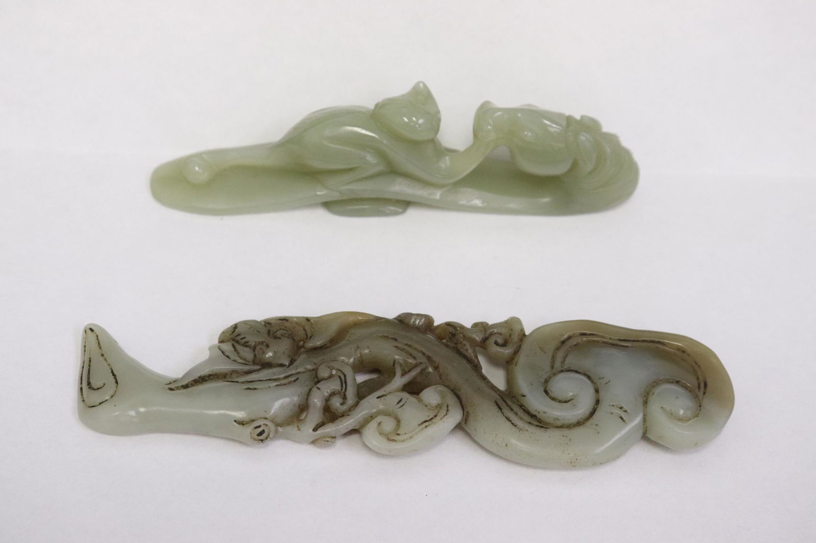 2 piece Chinese celadon jade carved ornaments: 2 piece Chinese celadon jade carved ornaments, 4"L, 4.85"L