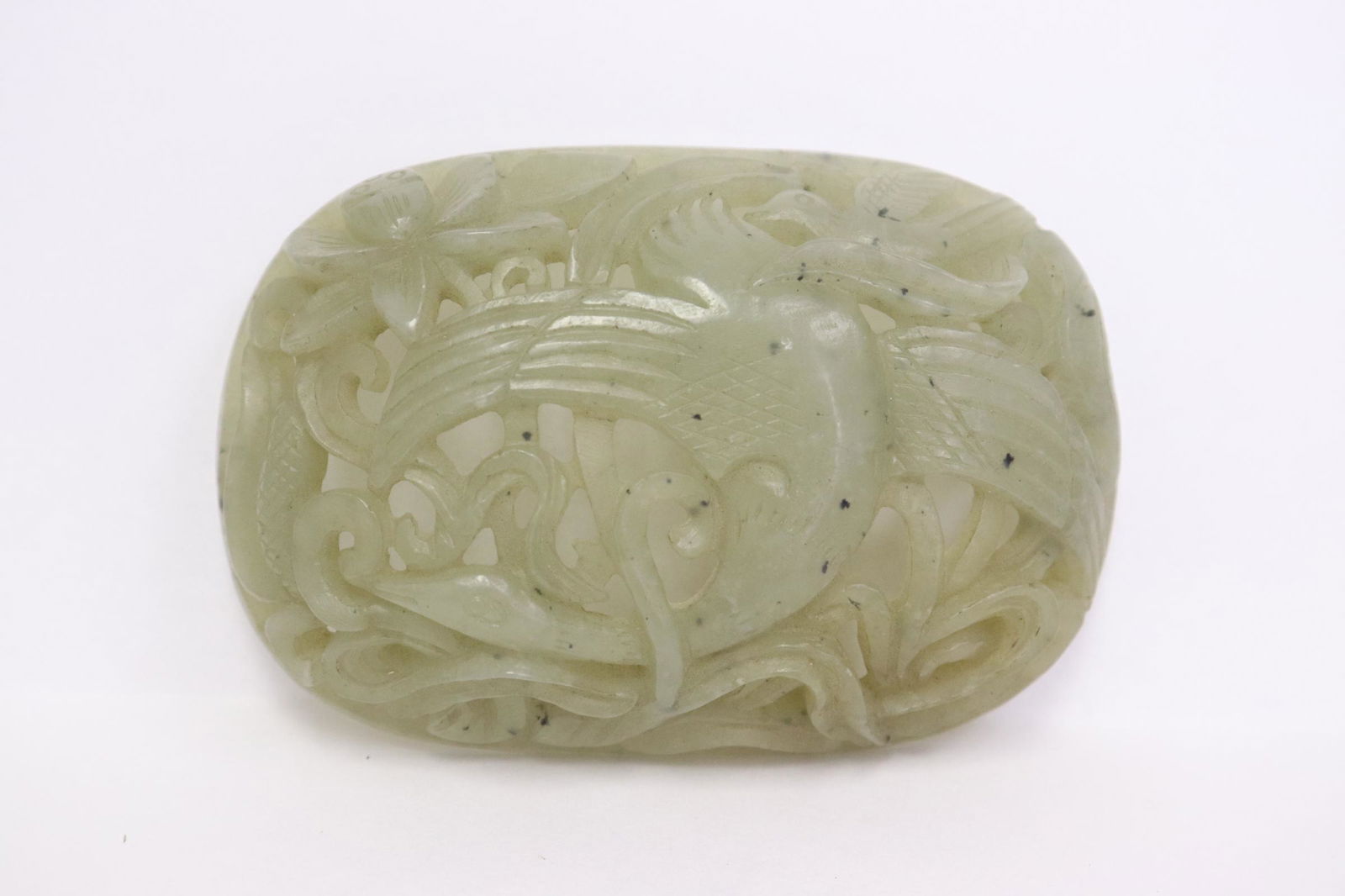 Celadon jade carved ornament: Celadon jade carved ornament, possible a box finial, 0.8"x3.4"x2.3"