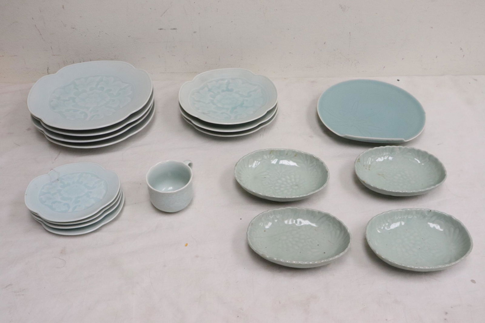 Lot of Chinese/ Japanese celadon porcelain plates: Lot of Chinese/ Japanese celadon porcelain plates, 2.6"x4"x3" - 1.3"x9.3"x8.7"