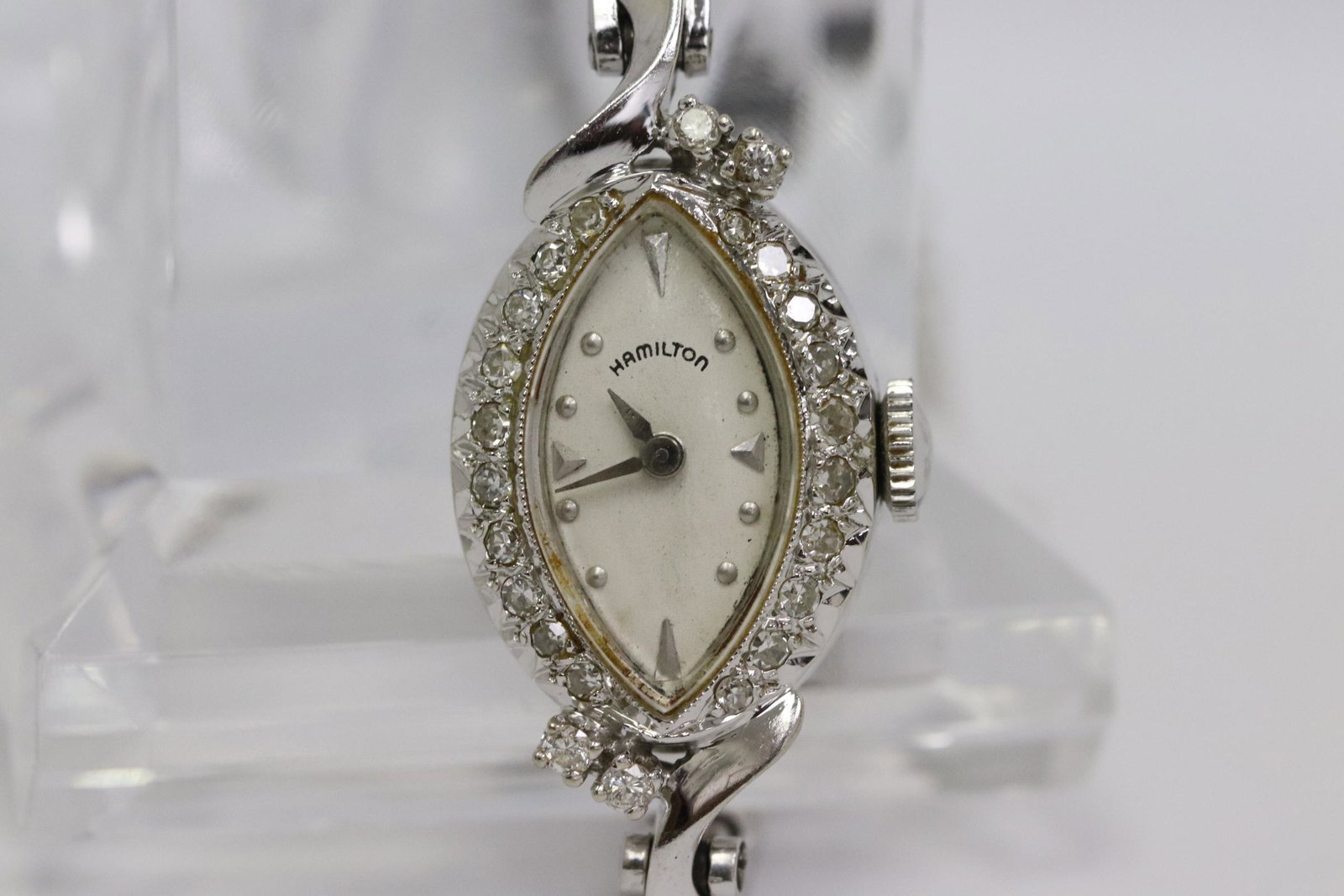 14K W/G Hamilton diamond wrist watch: Fine lady's 14K W/G Hamilton diamond wrist watch attached to a 14K W/G diamond bracelet, tdw approx. 0.50ct, wt. 17 gms