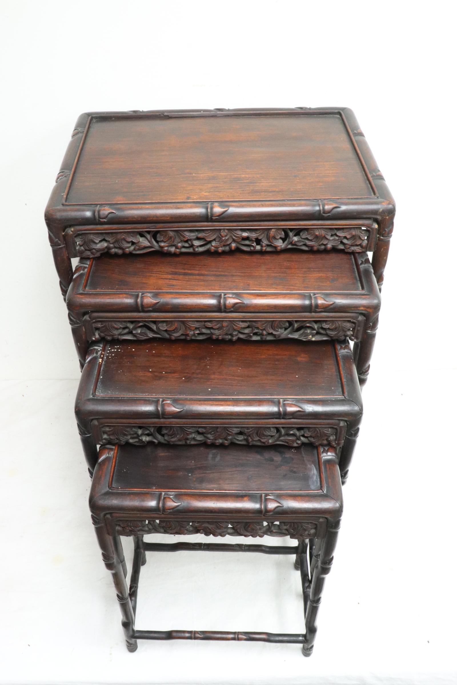 4 Chinese 19th/20th c. rosewood nested tables: 4 Chinese 19th/20th century rosewood nested tables, 19"x13.3"x7.5" - 28.8"x20.2"x14.5"