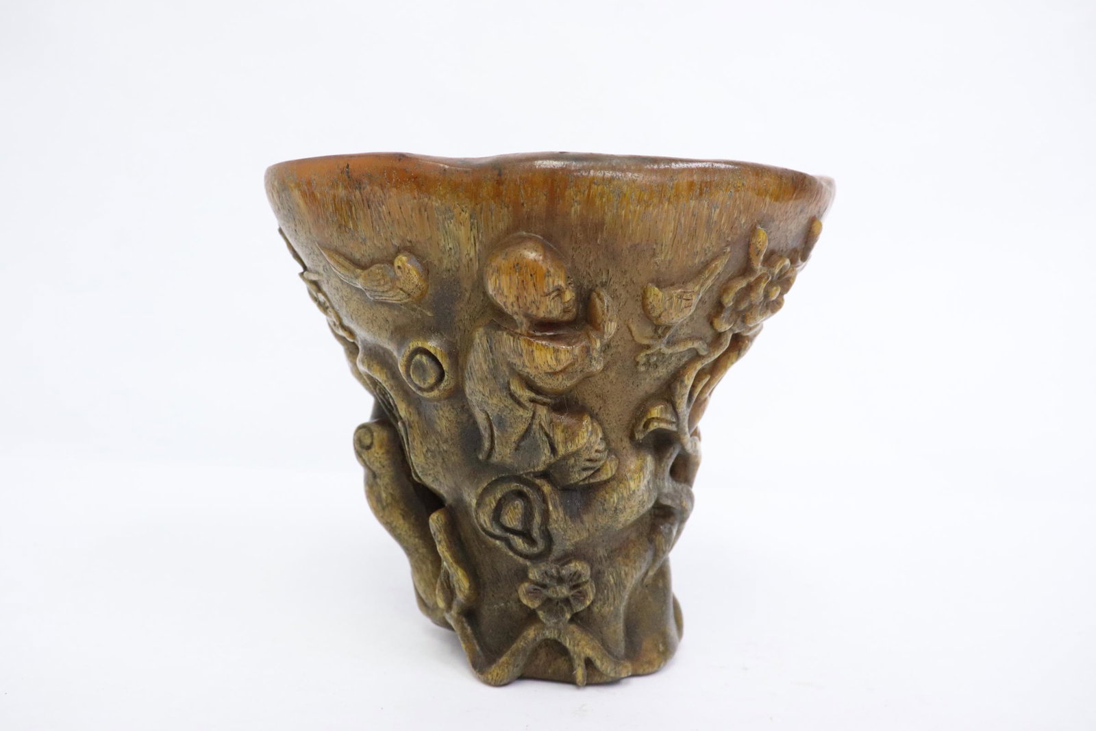 A simulated horn libation cup: A simulated horn libation cup, 4.9"x5.4"x4.3"