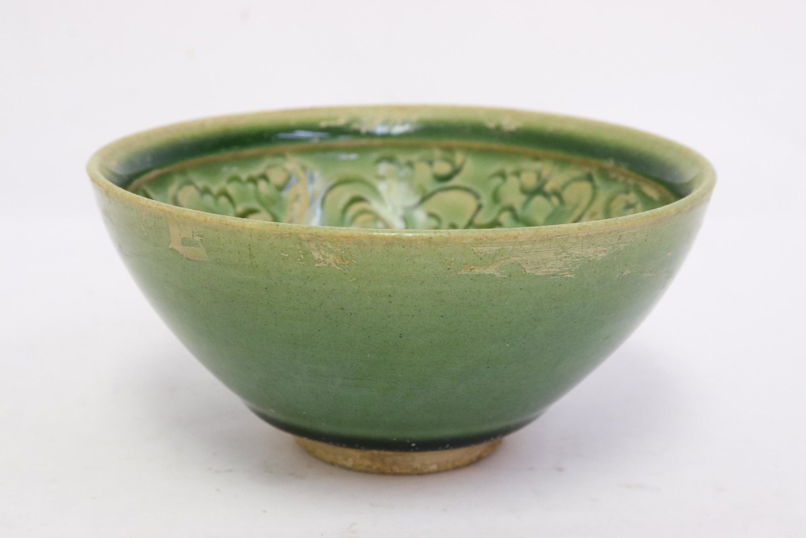 A green glazed earthenware bowl: A green glazed earthenware bowl, 2.3"x4.75"dia