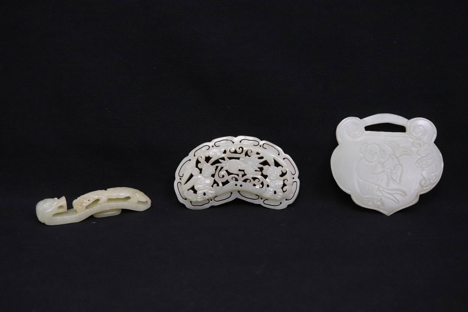 3 Chinese celadon jade carved ornaments: 3 Chinese celadon jade carved ornaments, 0.2"x2.25"x1.5" - 0.3"x2.8"x1.7"