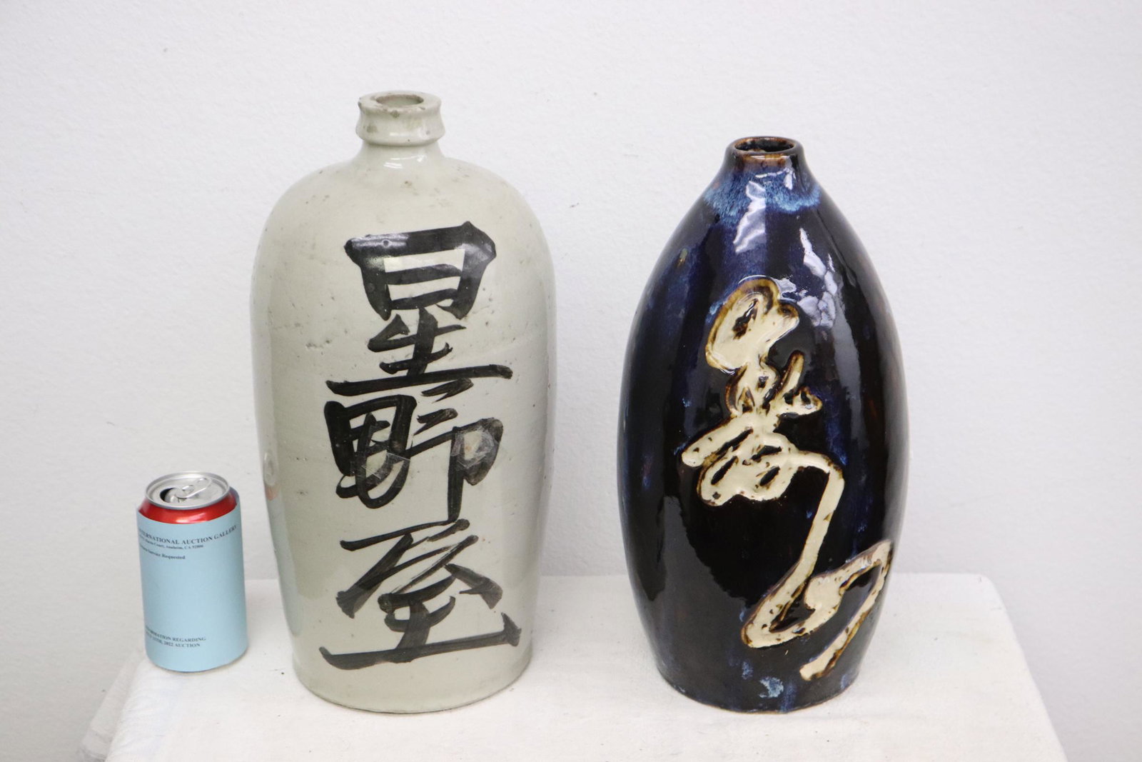 2 large Japanese vintage earthenware wine jars: 2 large Japanese vintage earthenware wine jars, 14"x7.5"dia, 15.2"x8.5"dia