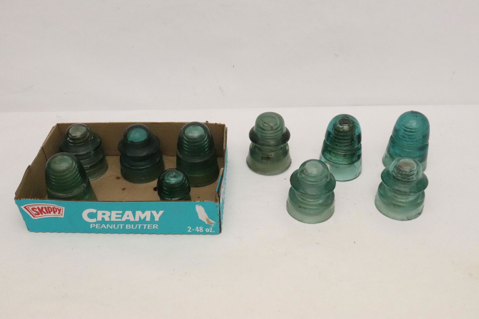 10 various blue/ green glass insulators (1 of 12)