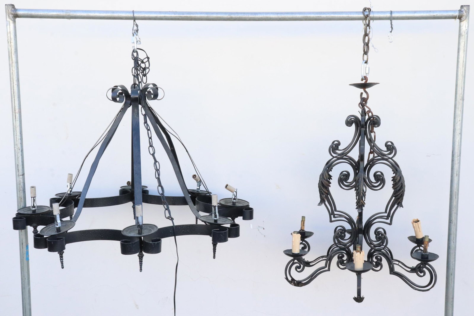 2 wrought iron chandeliers: 2 wrought iron chandeliers, 23.8"H, 27.7"H