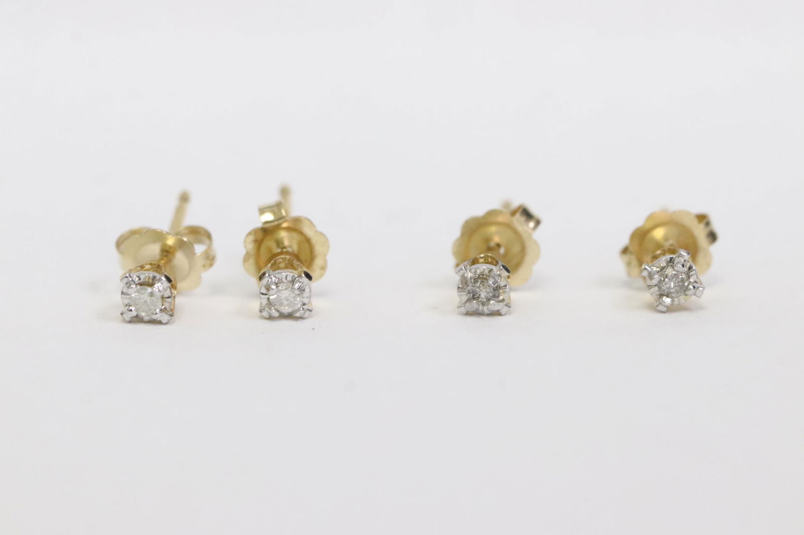 2 pairs of 14K Y/G diamond earrings (1 of 9)