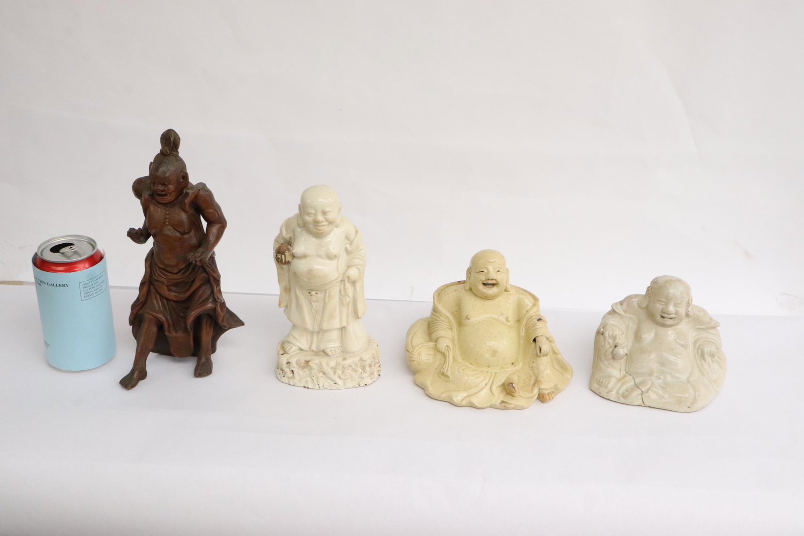 4 antique Japanese earthenware deities: 4 antique Japanese earthenware deities, chips, cracks, 4"H - 9.4"H