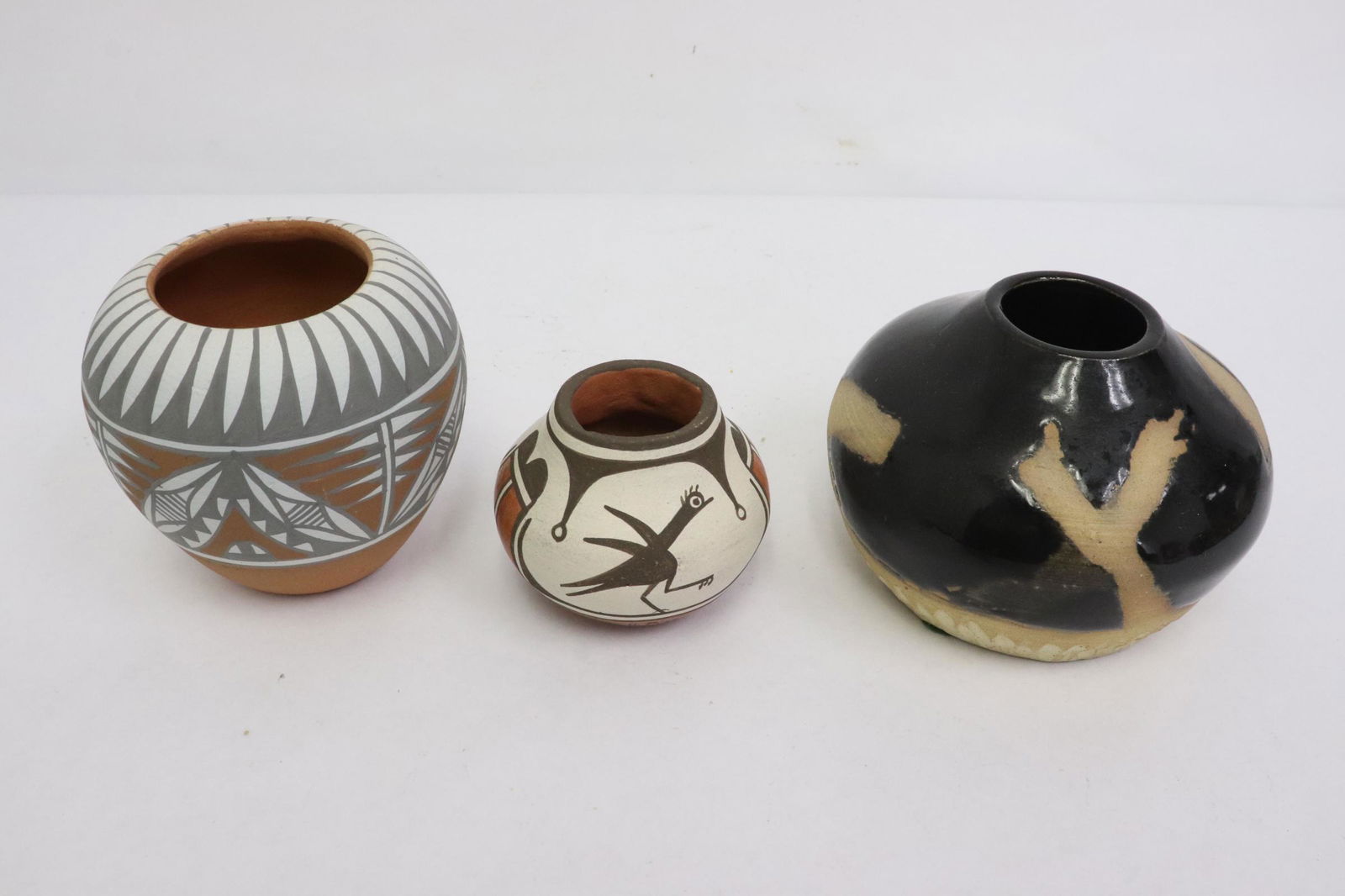 3 Native Indian hand decorated pottery jars (1 of 12)